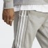 Мужские брюки adidas ESSENTIALS FRENCH TERRY TAPERED CUFF 3-STRIPES  (АРТИКУЛ:IC9407)